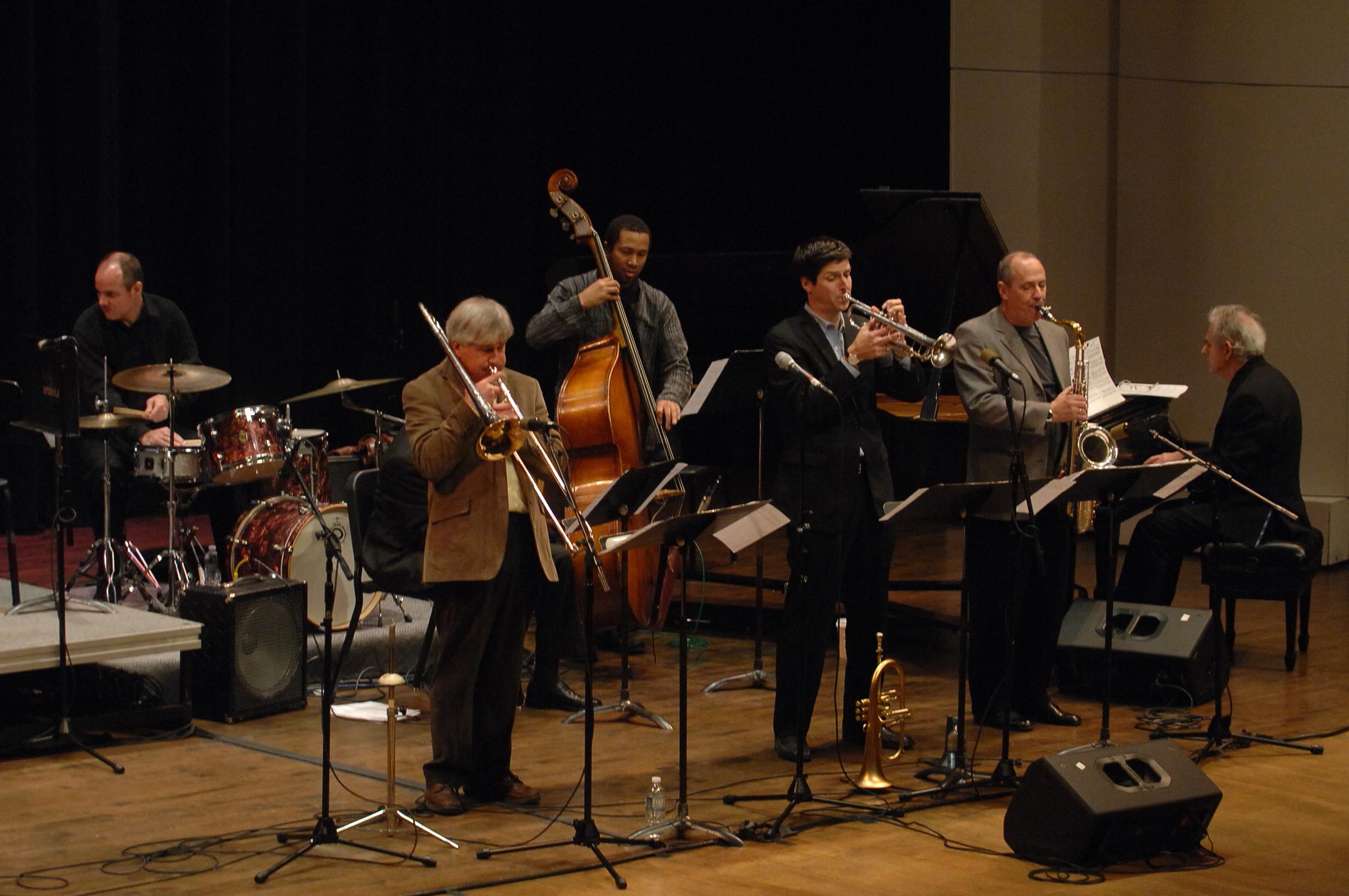 A jazz band consisting of Loyola Faculty performs in Roussel Hall.